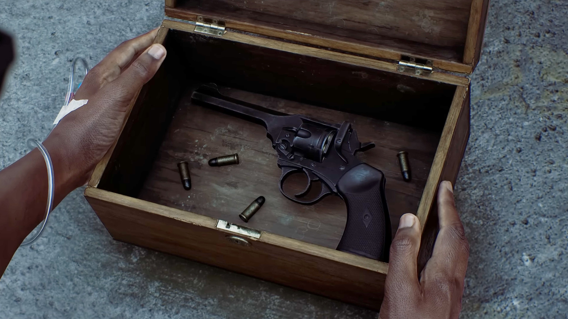 Silent Hill: Townfall - Simon opening a wooden box with a pistol and a few bullets