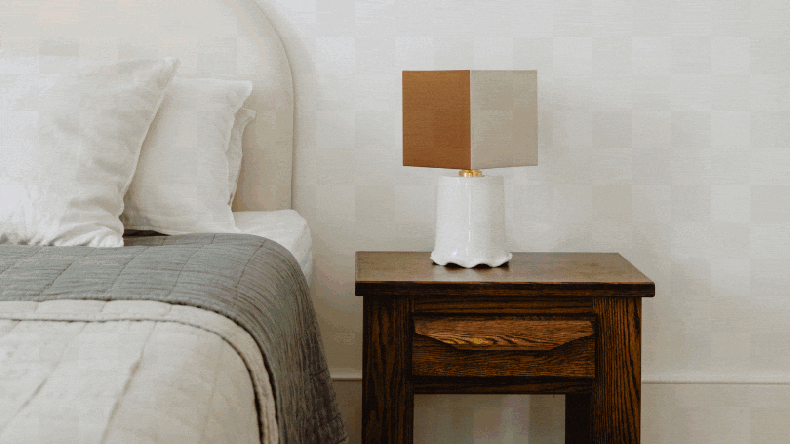 Rotating GIF of three images depicting homeware in a home. There is a white bedroom with a square lamp, a JW Anderson homeware showroom, and a close-up of plaster tile.