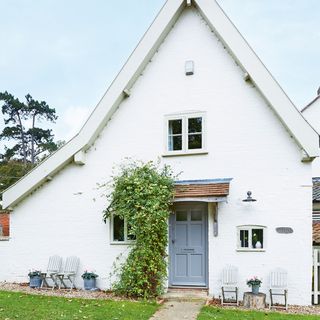 exterior of white painted grade II listed farmhouse