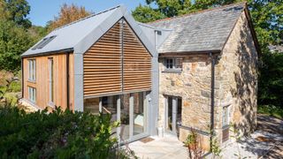 contemporary two storey extension to barn conversion