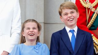 Princess Charlotte of Cambridge and Prince George of Cambridge watch a flypast from the balcony of Buckingham Palace during Trooping the Colour on June 2, 2022 in London, England. (Photo by Max Mumby/Indigo/Getty Images)