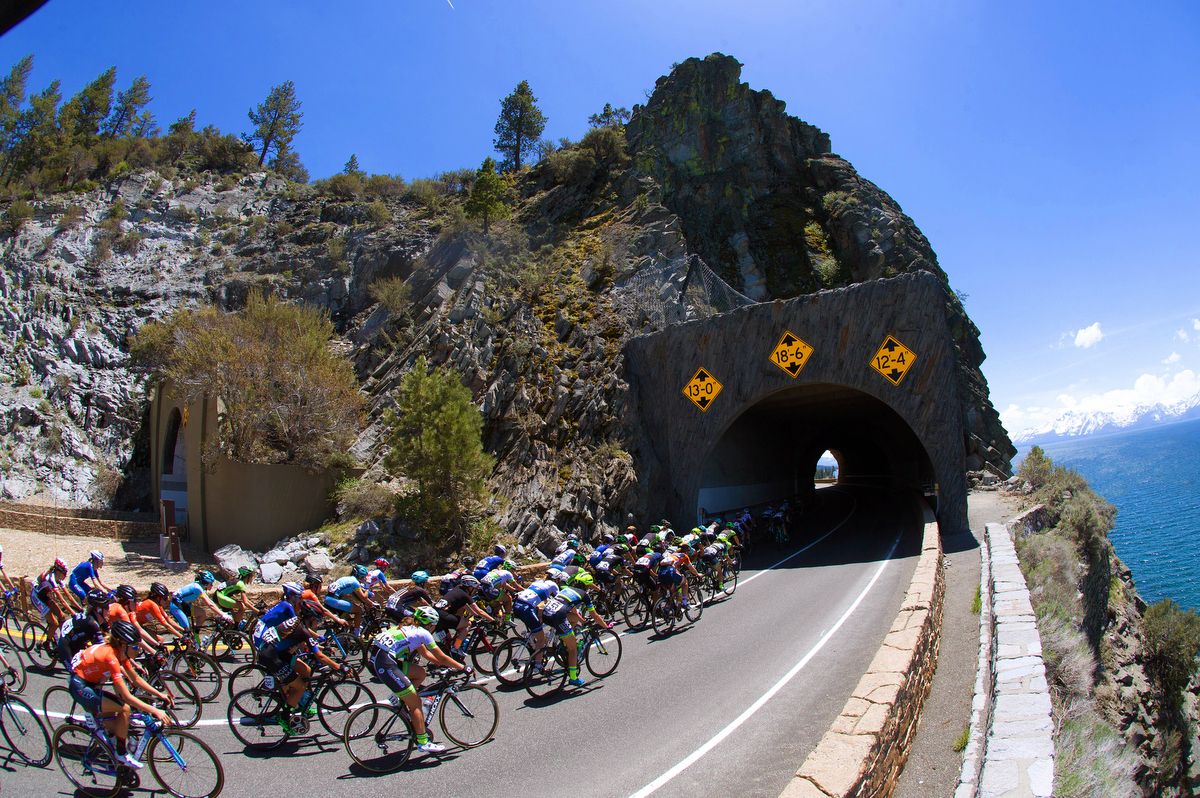The peloton enters a tunnel on course