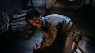 Ash and possessed hand in Evil Dead II