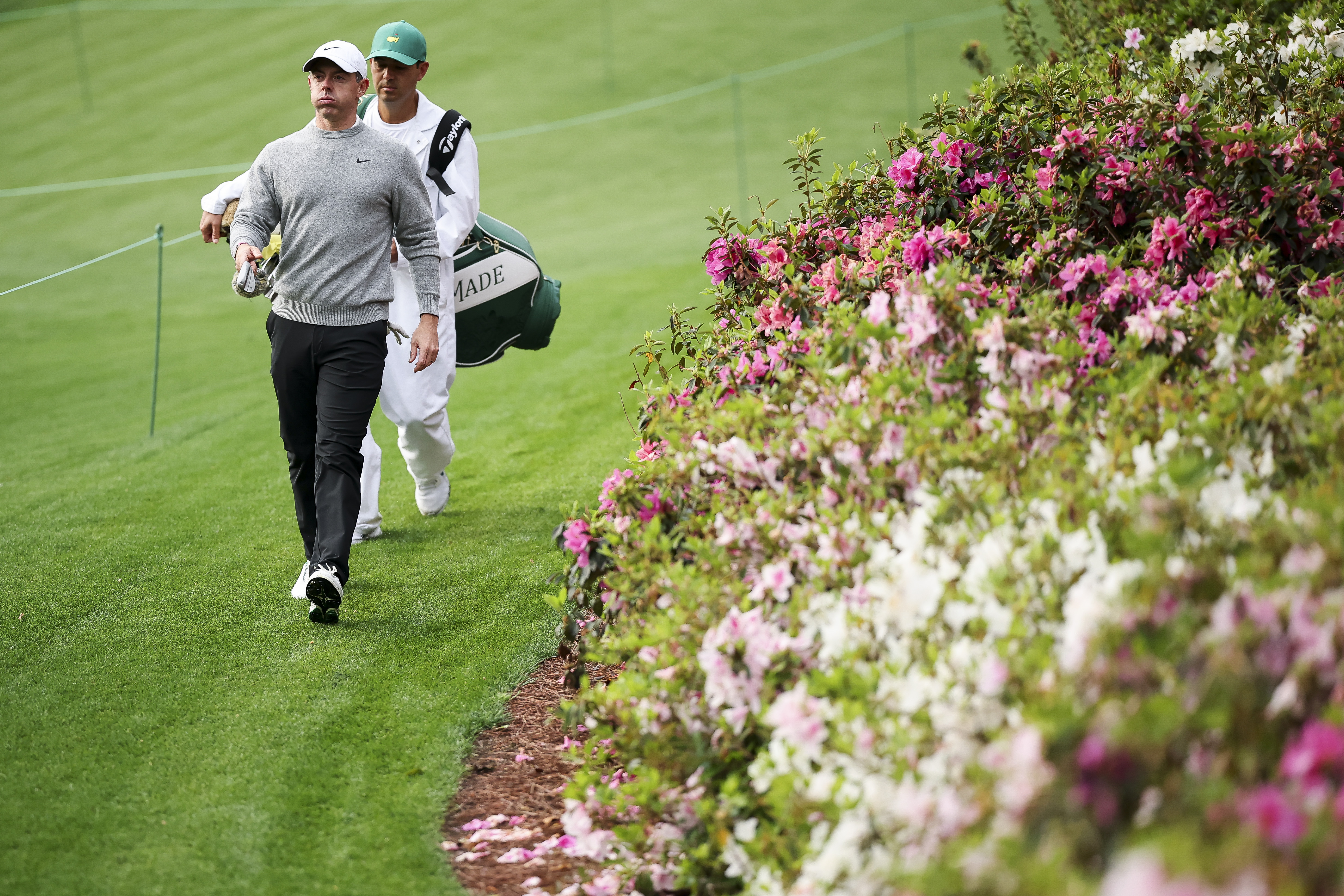 AUGUSTA, GEORGIA - APRIL 07: Rory McIlroy of Northern Ireland and his caddie Harry Diamond walk the sixth hole during a practice round prior to the 2026 Masters Tournament at Augusta National Golf Club on April 07, 2026 in Augusta, Georgia. (Photo by Hector Vivas/Getty Images)