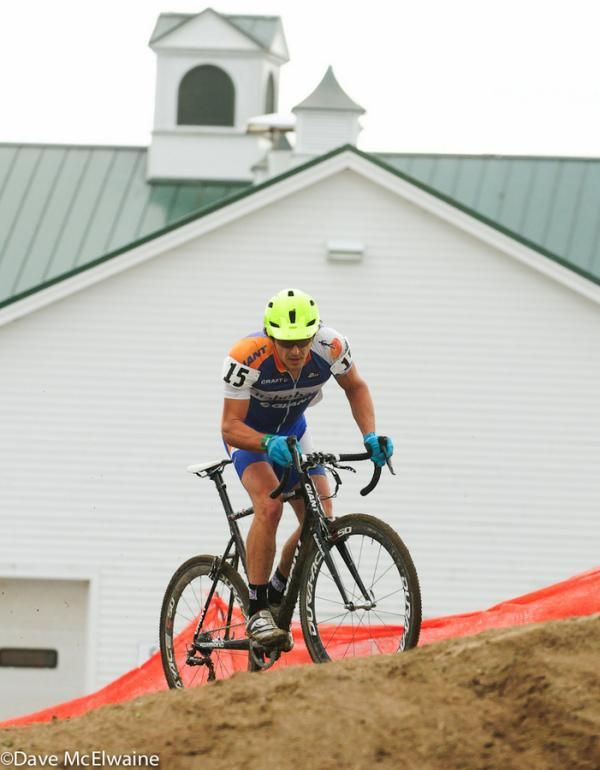 Adam Craig (Rabobank Giant) passing by the cow barns with one lap to go