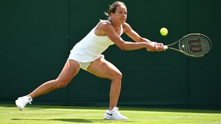 Barbora Strycova of Czech Republic plays a backhand against Maryna Zanevska of Belgium in the Women's Singles first round match on day one of The Championships Wimbledon 2023 at All England Lawn Tennis and Croquet Club on July 03, 2023 in London, England. 