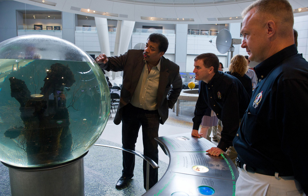 Dr. Neil deGrasse Tyson Displays Museum Exhibit to Astronauts Walheim and Hurley