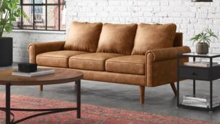 A brown couch in a living room