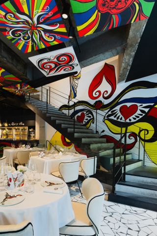 Moët in Paris by Allenos restaurant interior with vibrant coloured mural and ceiling