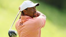 Tiger Woods of the United States plays his shot from the 16th tee during the first round of the 2024 PGA Championship at Valhalla Golf Club