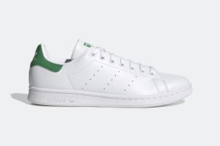 white adidas stan smith shoes with bright green label, sustainable trainers