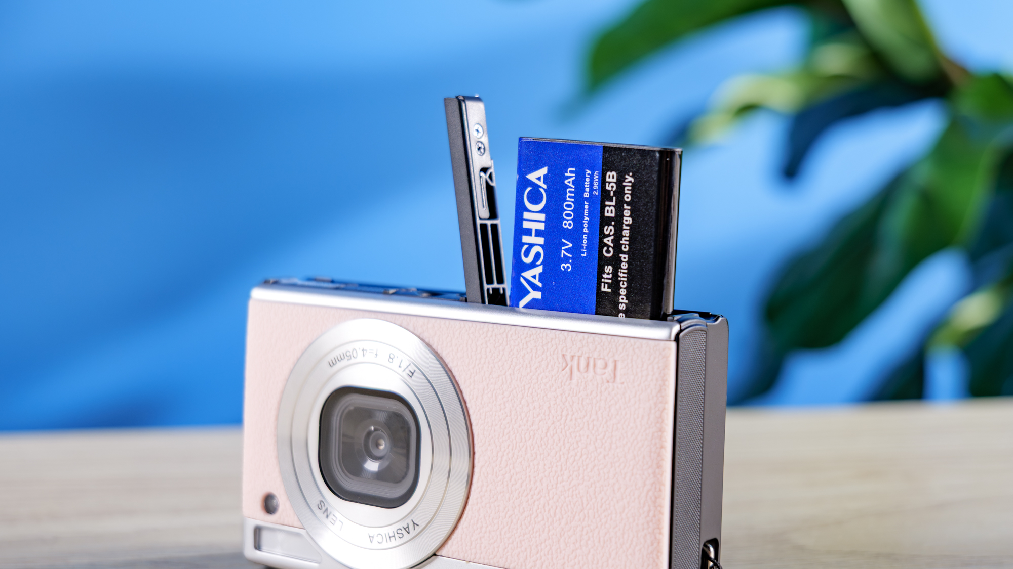Yashica Tank in pink photographed in front of a blue background