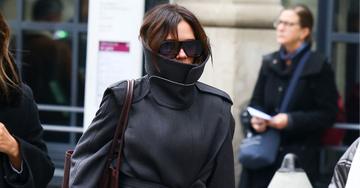 Victoria Beckham Styled a Funnel Neck Coat With Her Favourite Puddle Pants