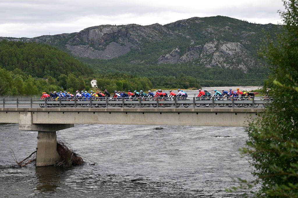HAMMERFEST NORWAY AUGUST 18 A general view of the peloton competing during the 10th Arctic Race of Norway Stage 2 a 1534km stage from Alta to Hammerfest on August 18 2023 in Hammerfest Norway Photo by Luc ClaessenGetty Images