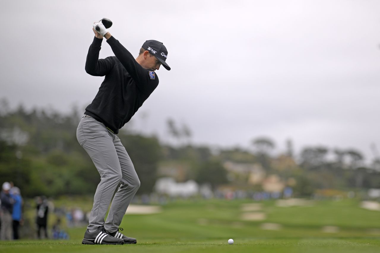 Jacob Bridgeman hits a fairway wood
