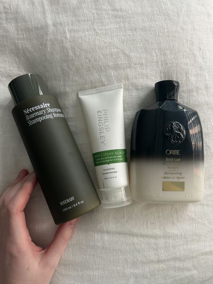 Some of the best shampoos for dry scalps on a white linen background