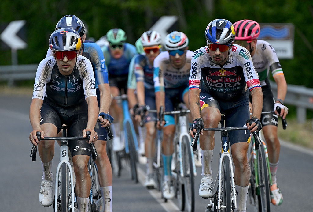 SIENA ITALY MAY 18 LR Thomas Pidcock of Great Britain and Team Q365 Pro Cycling and Primoz Roglic of Slovenia and Team Red Bull BORA hansgrohe compete in the chase group during the 108th Giro dItalia 2025 Stage 9 a 181km stage from Gubbio to Siena UCIWT on May 18 2025 in Siena Italy Photo by Tim de WaeleGetty Images