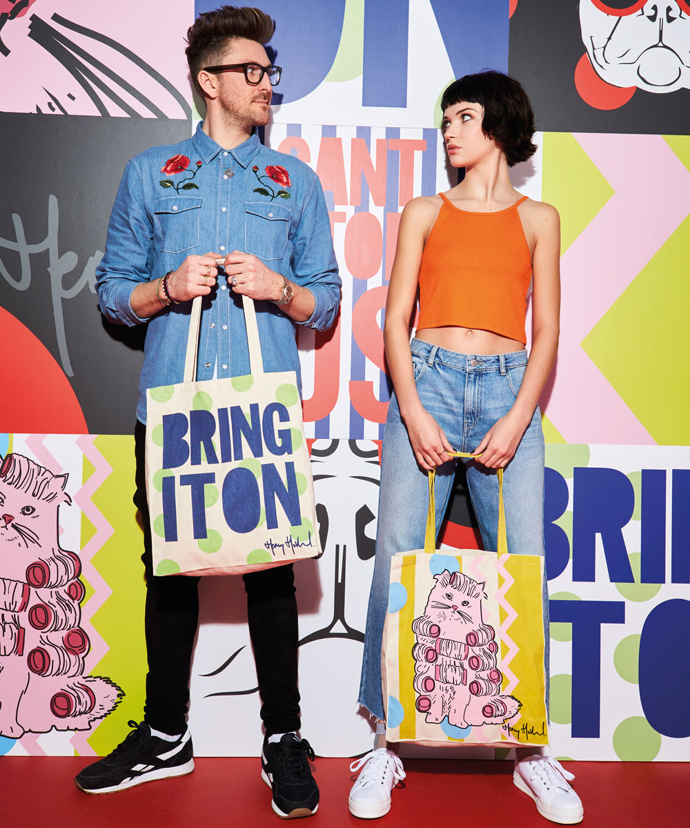 man and woman carrying tote bag