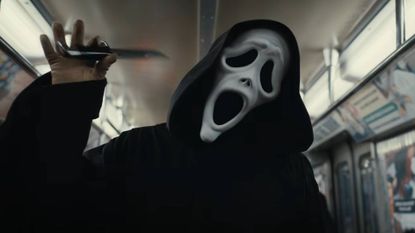 Ghostface waggling a knife while on a subway car in the trailer for Scary Movie 6
