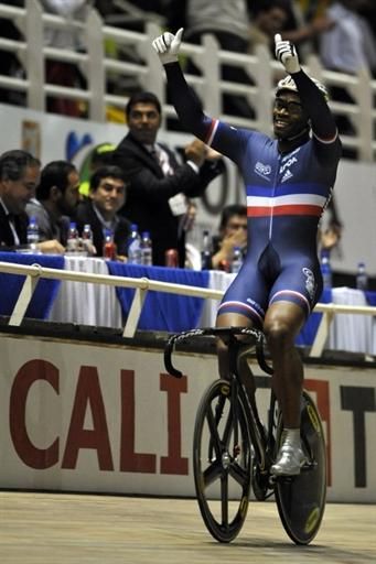 Gregory Bauge (France) celebrates his team's win in the men's team sprint in Cali.