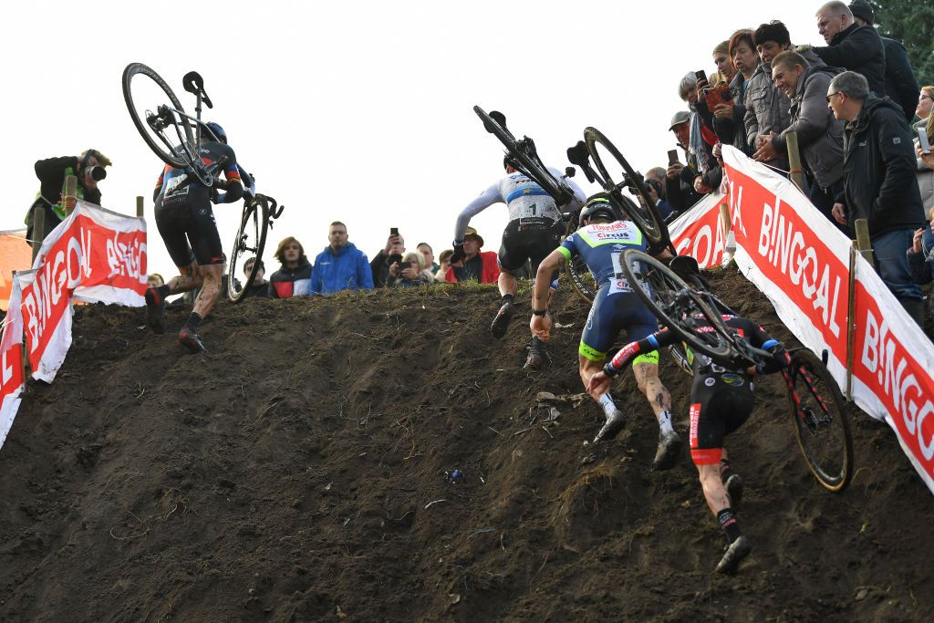 NIEL BELGIUM NOVEMBER 11 LR Toon Aerts of Belgium and Team Baloise Trek Lions Lars Van Der Haar of The Netherlands and Team Baloise Trek Lions and The Peloton climb a circuit ramp during the 30th Superprestige Niel Jaarmarktcross 2021 Mens Elite SPNiel Superprestige2022 on November 11 2021 in Niel Belgium Photo by Luc ClaessenGetty Images