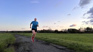 A man runs along a path