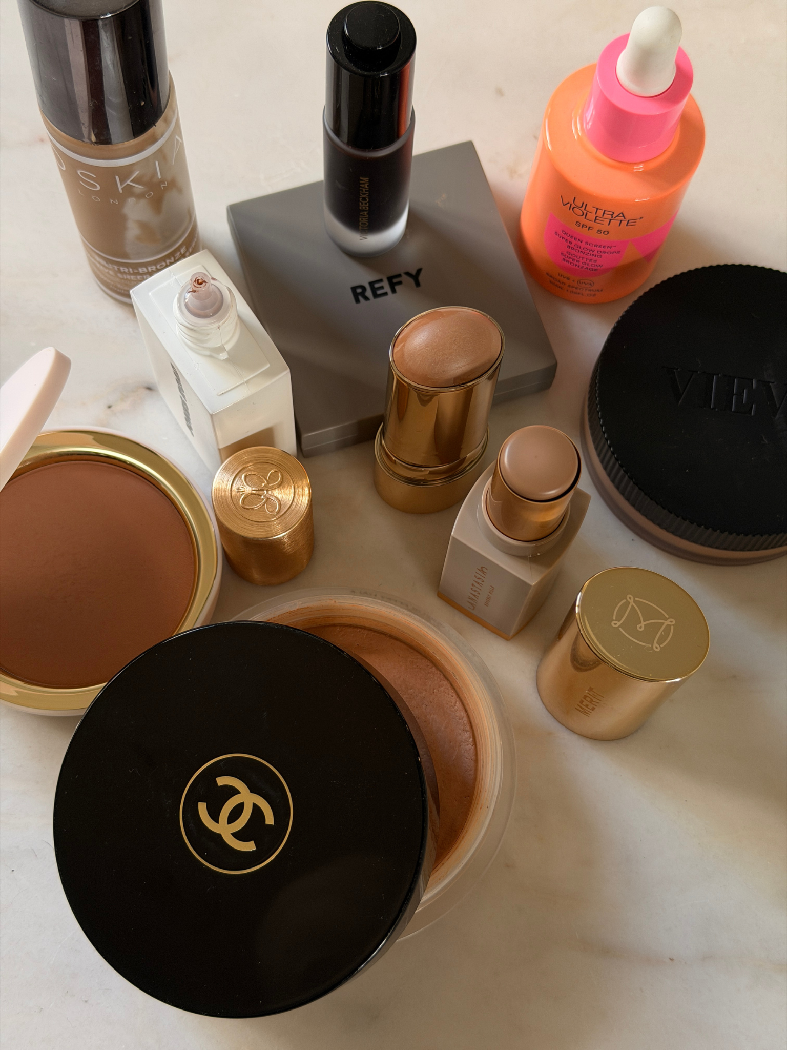A photo of bronzers on a table