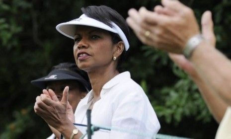 Then Secretary of State Condoleezza Rice watches golfers on the first hole during the AT&amp;amp;T National golf tournament at Congressional Country Club in Bethesda, Md., in July 2008: Rice, an avid