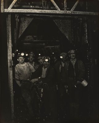 Coal miners underground. 