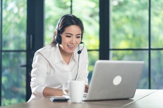 A call centre agent working from home