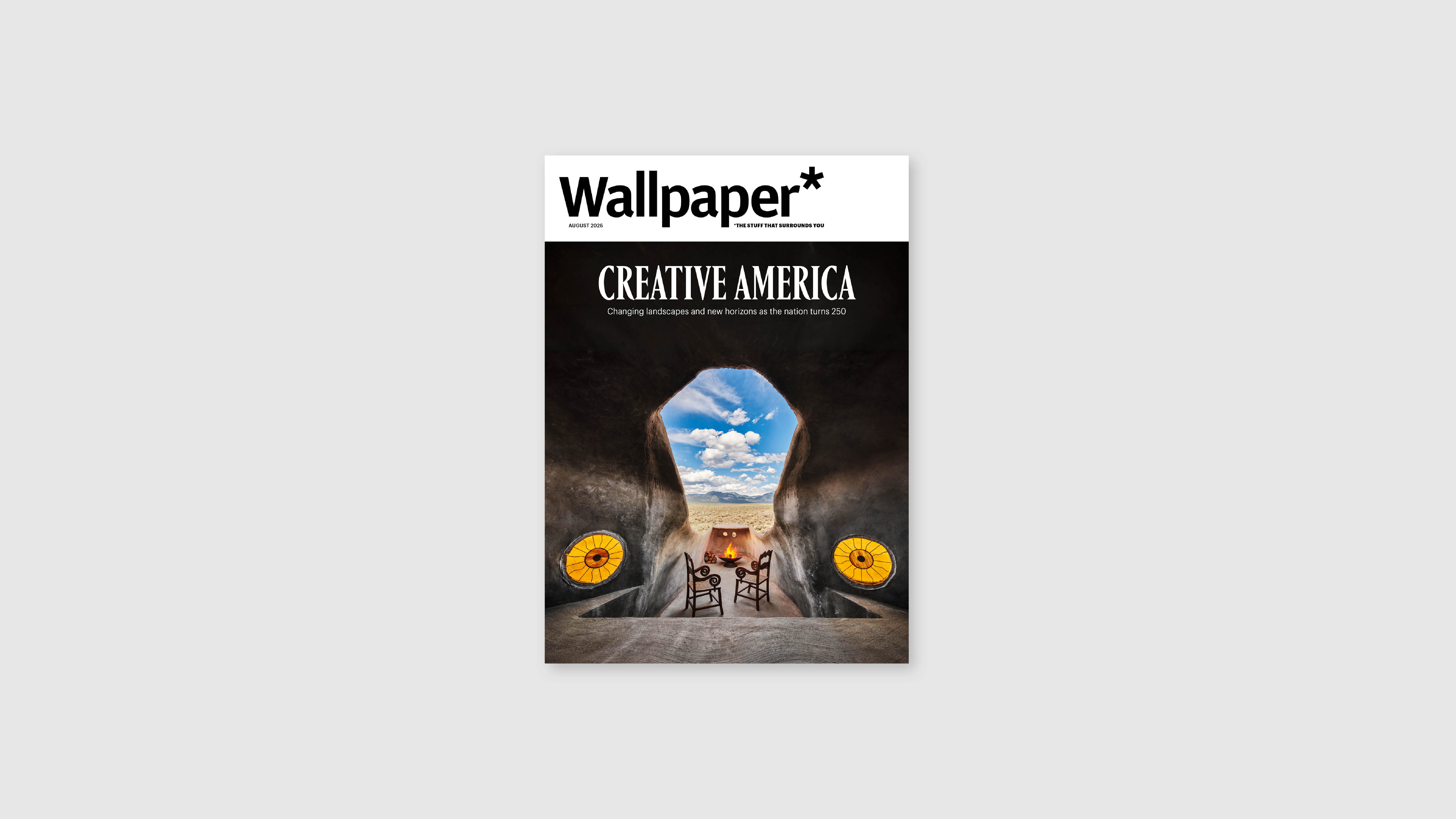 August 2026 Wallpaper* cover, featuring view of desert from cave-like room
