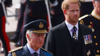 King Charles, Prince Harry walking