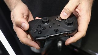 Game enthusiasts test the Xbox 'Elite Wireless Controller Series 2' during the E3 Video Game Convention at the Microsoft Theater on June 11, 2019 in Los Angeles, California..