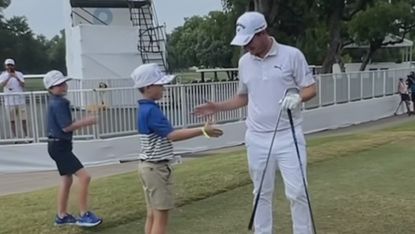 Emiliono Grillo invites two young fans to take shots with him at the 2023 Charles Schwab Challenge