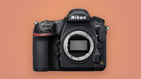 Image shows the Nikon D850 against an orange background.