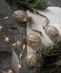 Mercury Walnut Christmas Decorations – Set Of 4 | £15.00 on The White Company