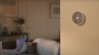 The Google Nest Thermostat installed on a wall in a home