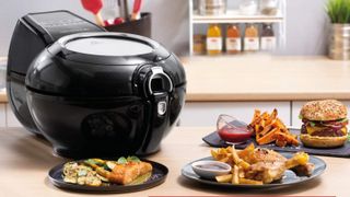 a lifestyle image showing the Tefal air fryer in action