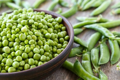 Wooden Bowl Full Of Peas