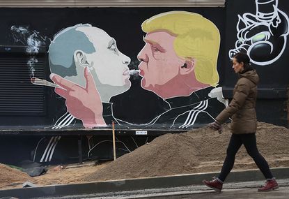 A mural of Donald Trump and Vladimir Putin