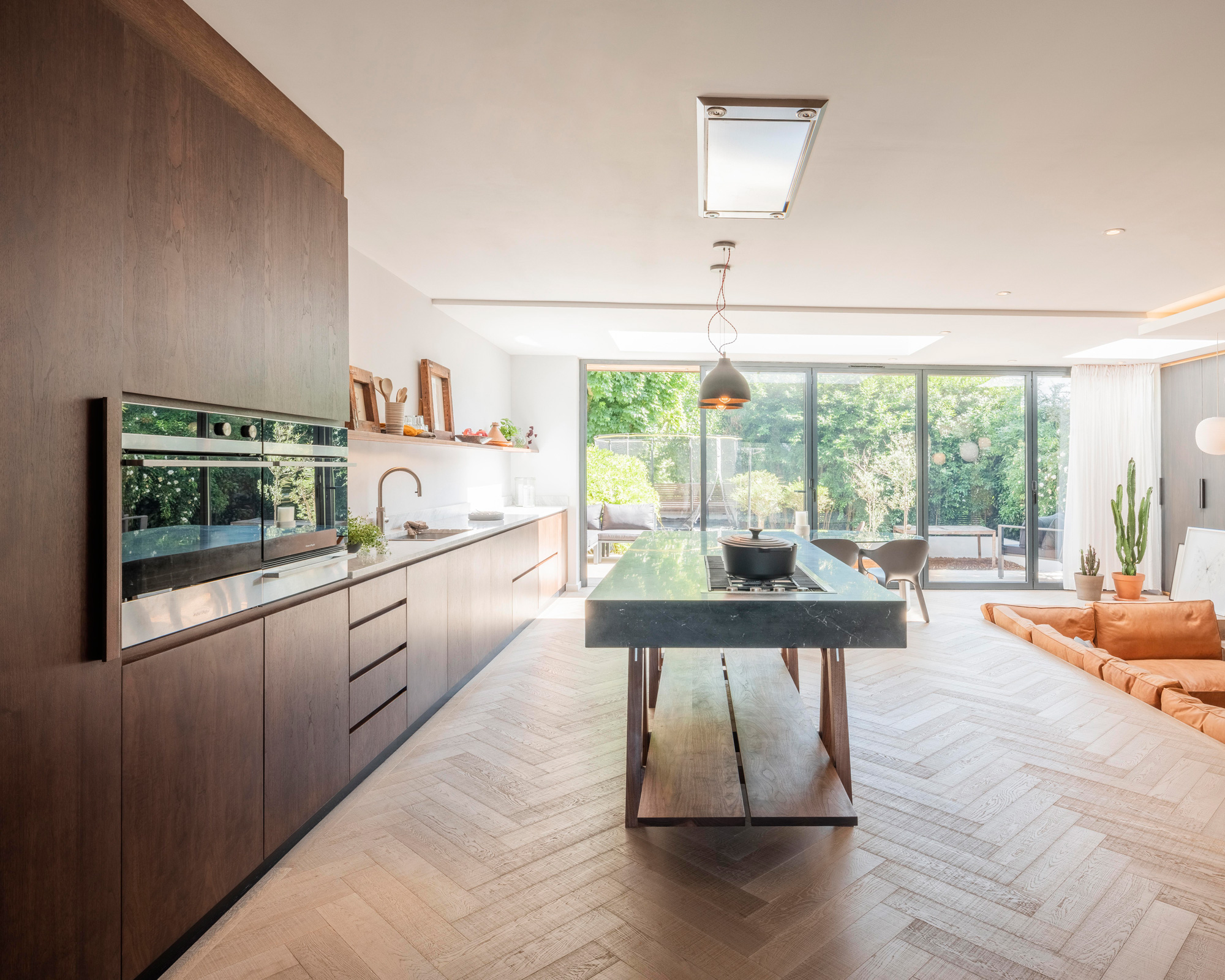 contemporary wood kitchen with integrated crown molding