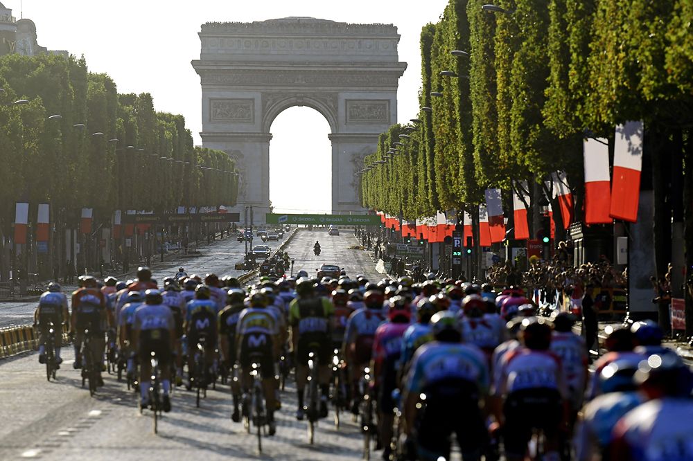 The peloton racing on the Champs Elysees stage 21 at the Tour de France