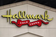 A Hallmark logo is displayed outside one of their stores on March 23, 2025 in San Diego, California. (Photo by Kevin Carter/Getty Images)