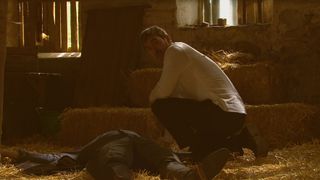 Cain Dingle crouches over Al Chapman's body