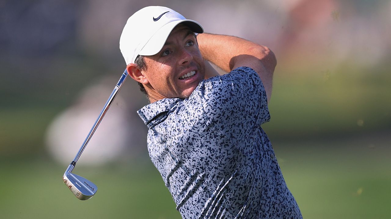 Rory McIlroy takes a shot at the 2023 Dubai Desert Classic