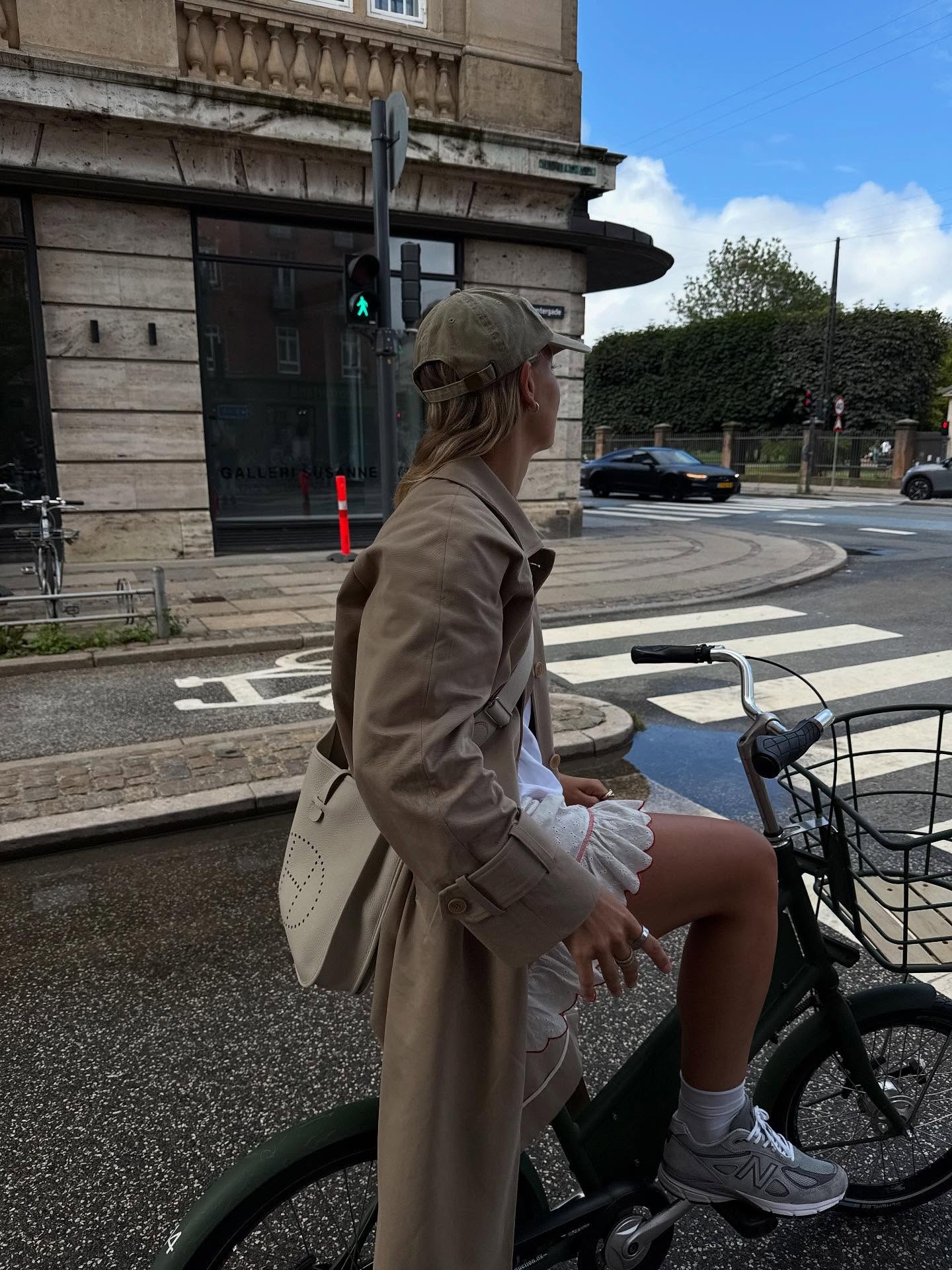 Hollie Mercedes wears an H&amp;amp;M trench coat.