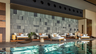 The pool and surrounding daybeds at Four Seasons Hotel Tokyo at Otemachi