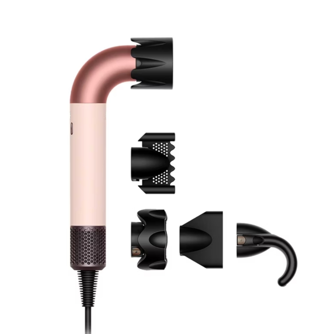 A product shot of the Dyson Supersonic r hair dryer with its attachments, pictured on a white background