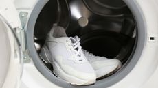 White sneakers in washing machine