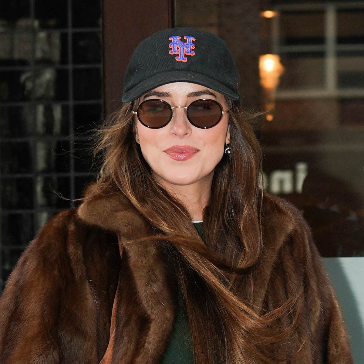 Dakota Johnson Just Wore the Pretty Winter Coat Trend That Makes Jeans Look Rich